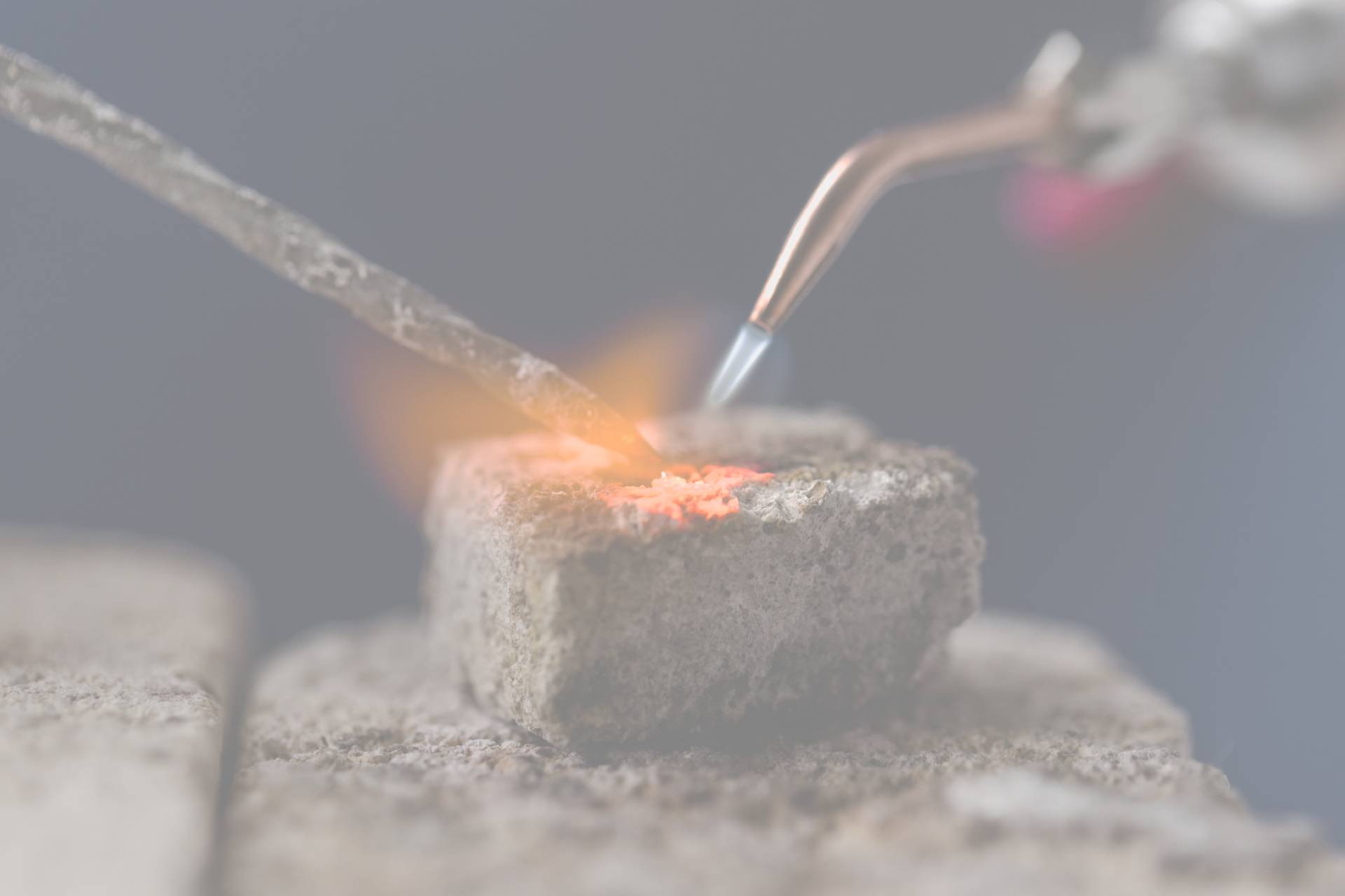 A jeweller melting metal
